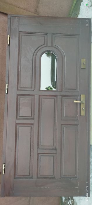 Drzwi zewnętrzne drewniane sosnowe z ościeżnicą stan bardzo dobry