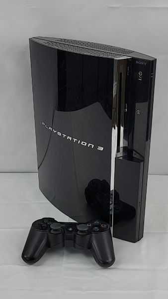PS3 80 GB + comando + 4 jogos