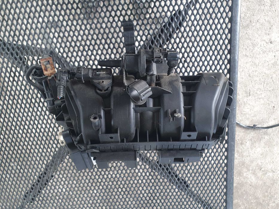 Kolektor ssacy Opel Corsa D 1.4 16v z14 xep sprawny