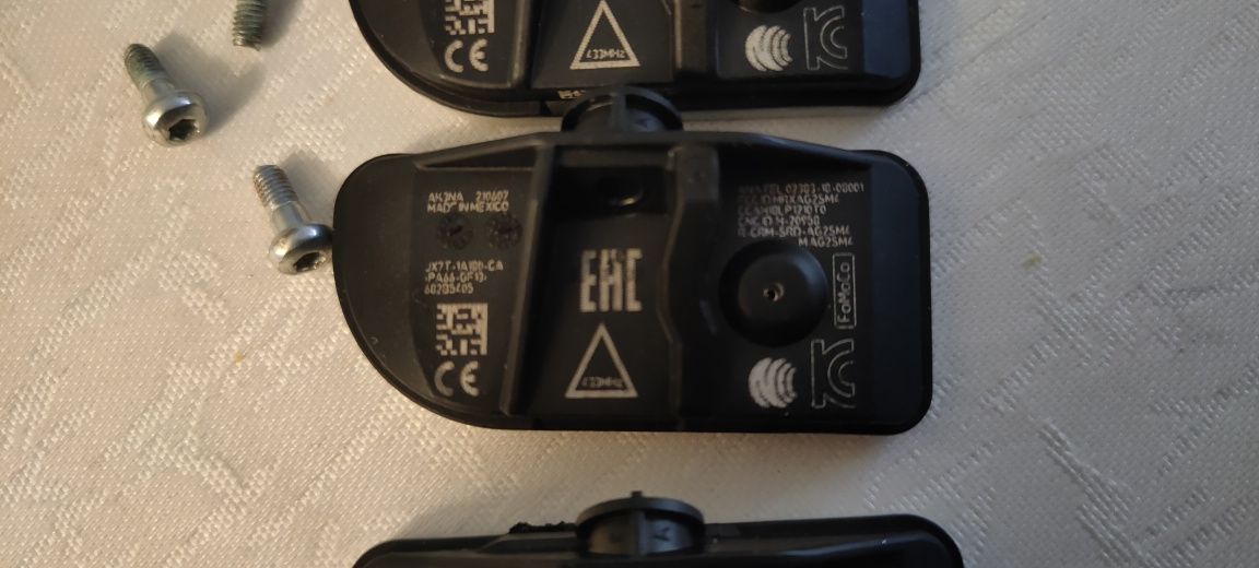 Czujnik ciśnienia opon Ford TPMS JX7T-1A180-CA FORD