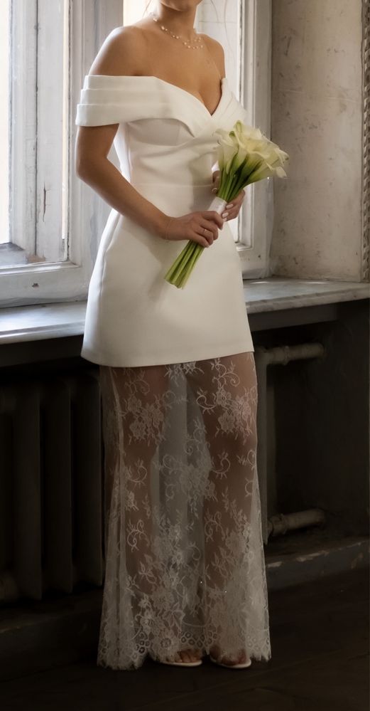 Елегантна біла сукня