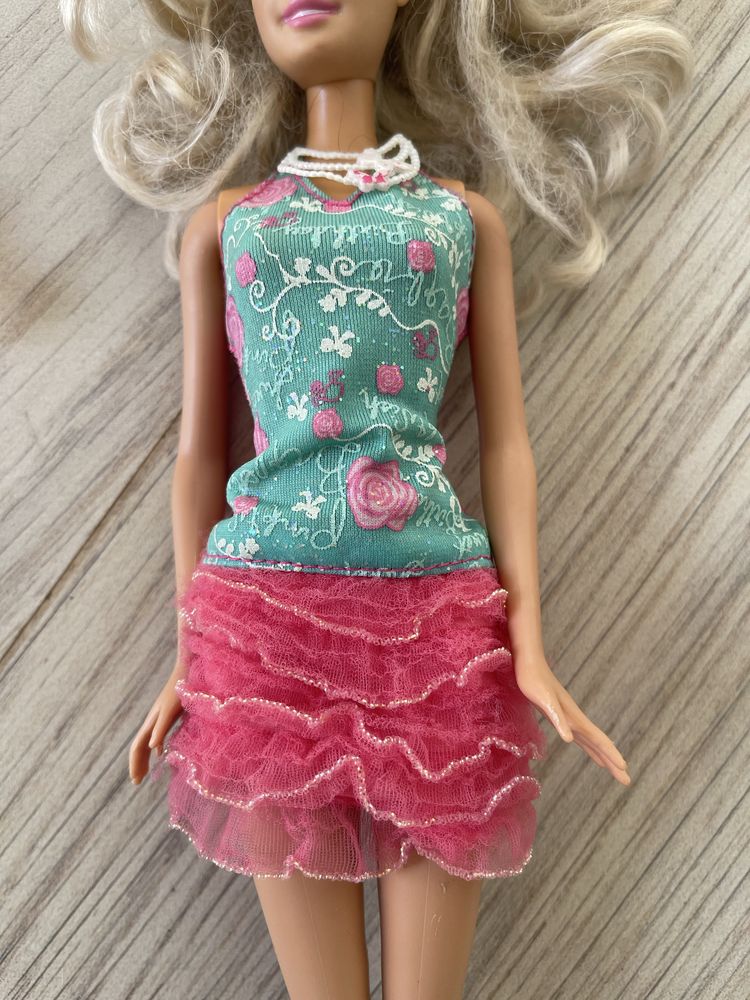 Barbie com alguns acessórios