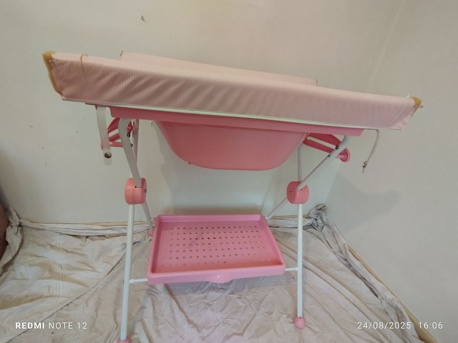 Muda Fraldas com banheira