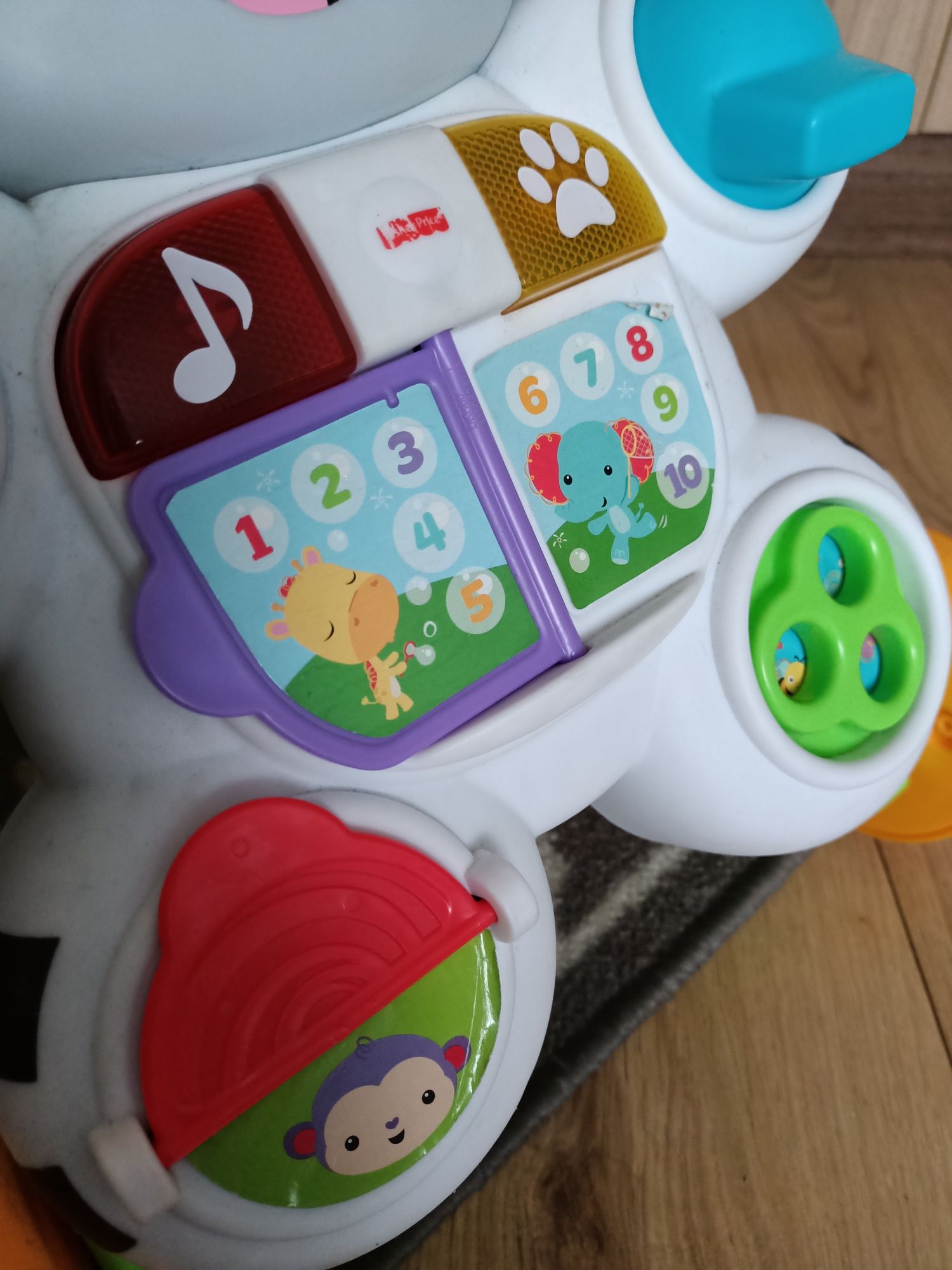 Pchacz jeździk Fisher Price zebra