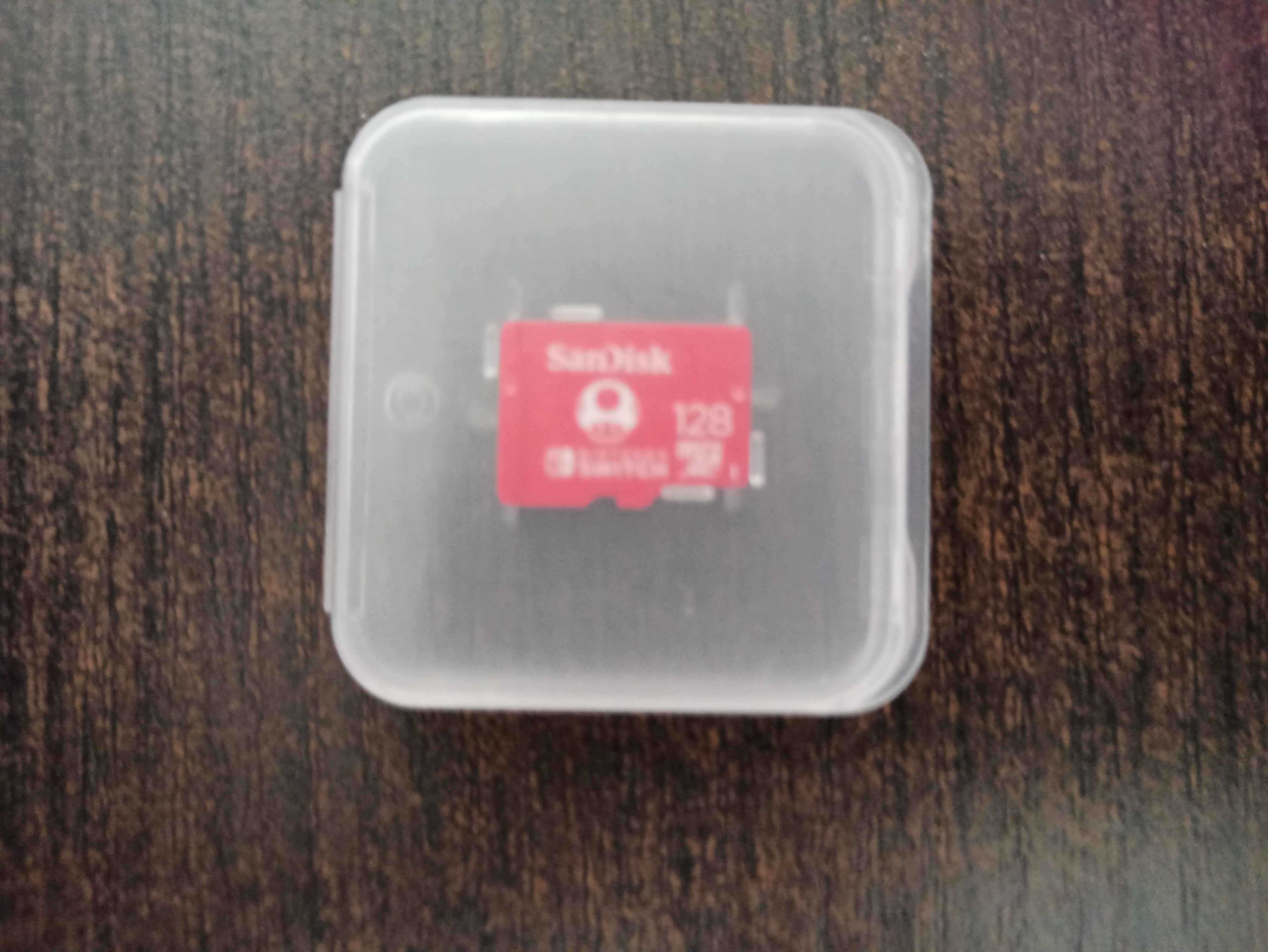 Nintendo Switch (ciemnoszary) + pokrowiec + gra + karta pamięci 128GB