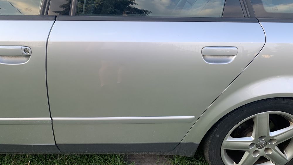 AUDI A4 B6 drzwi w kolor srebrne LY7W przód tył prawe lewe