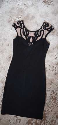 Чорна коктейльна сукня