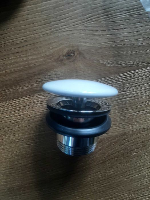 Korek do umywalki Roca Aqua A506.403.90C