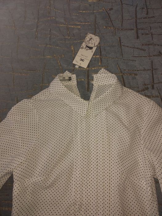 Блузка білого кольору в горошок, дуже красива нова