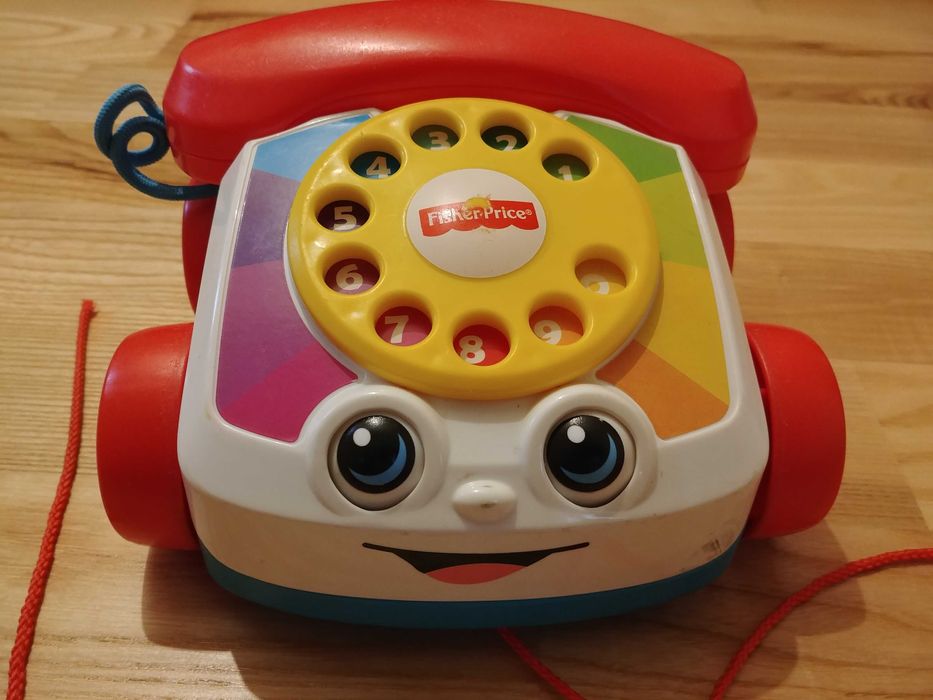 Fisher Price zestaw zabawek: piesek Snoopy, motylek, pelikan, telefon