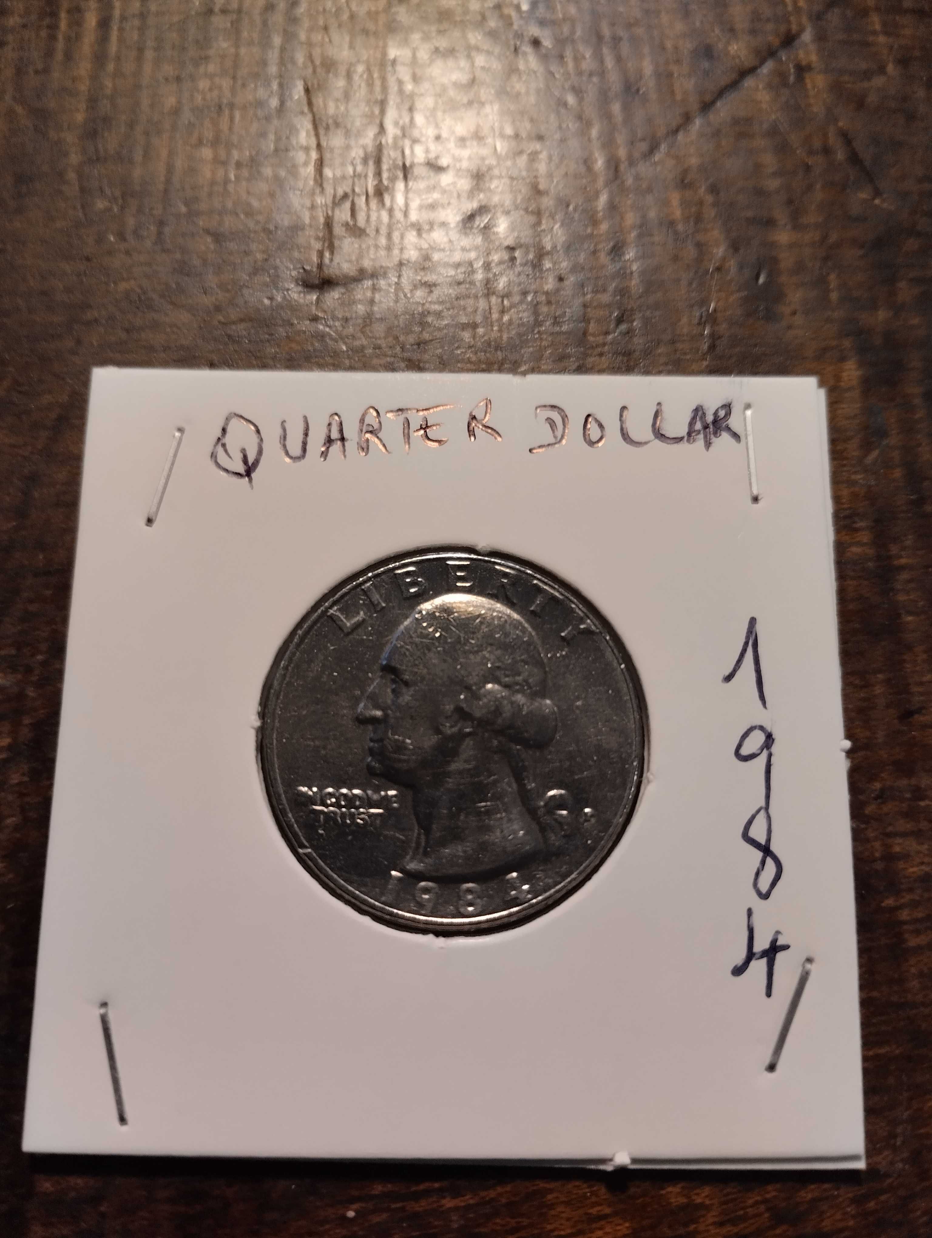 Quarter de dollar de 1984 com erro de cunhagem