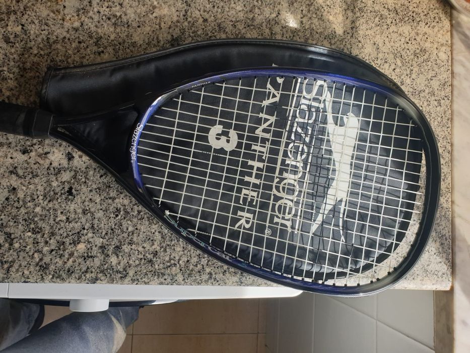 Raquete de tennis