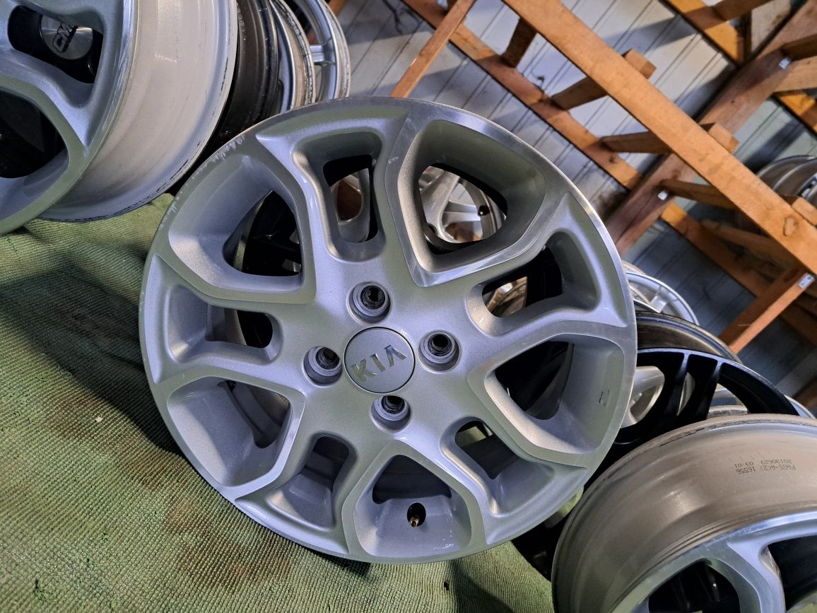 05 TSM alufelgi 4x100 5.5x15 et52 54.1 kia oryginalne srebrne polerowa