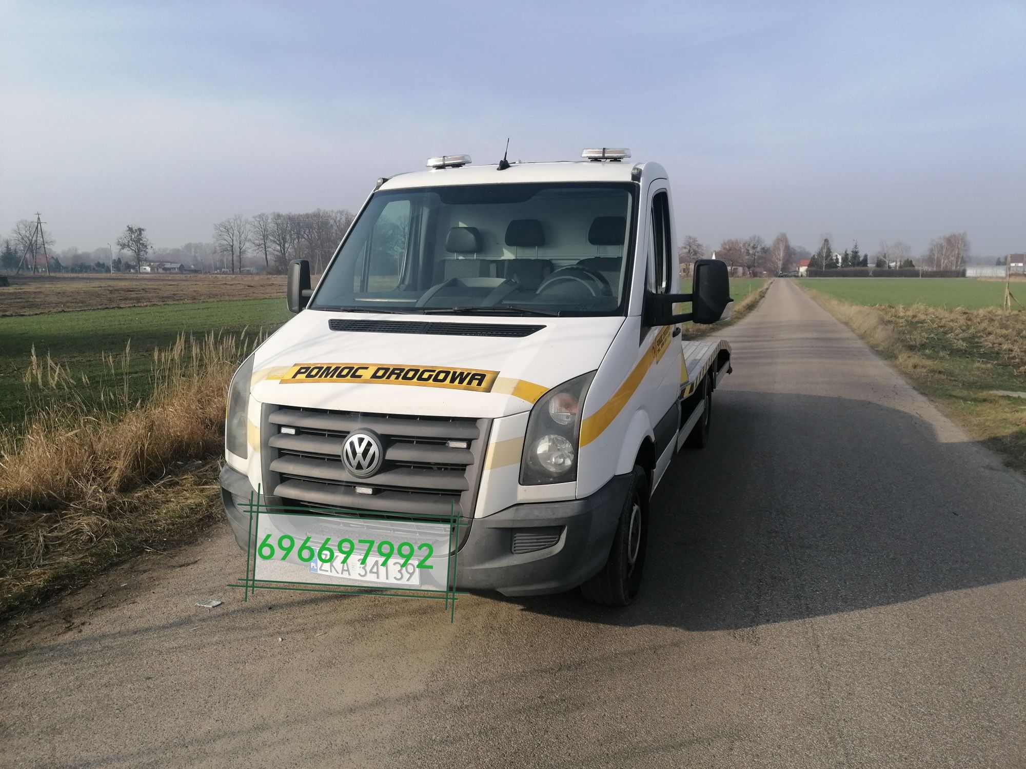 Pomoc Drogowa Autolaweta Transport Wynajem Przyczepka samochodowa
