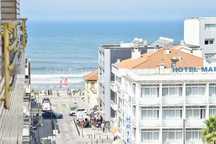 T2 Renovado c/ Garagem – Centro de Espinho (5.º piso, 3 frentes)