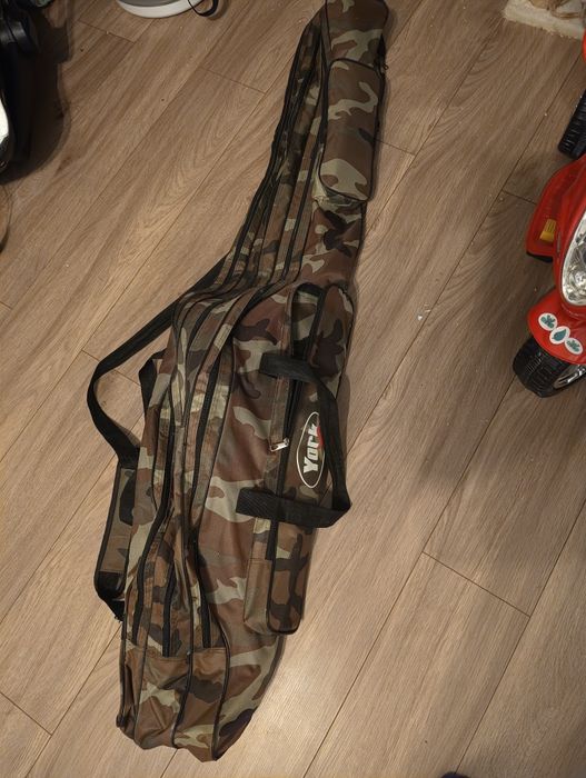 Sprzedam pokrowiec na wędki plus podbierak