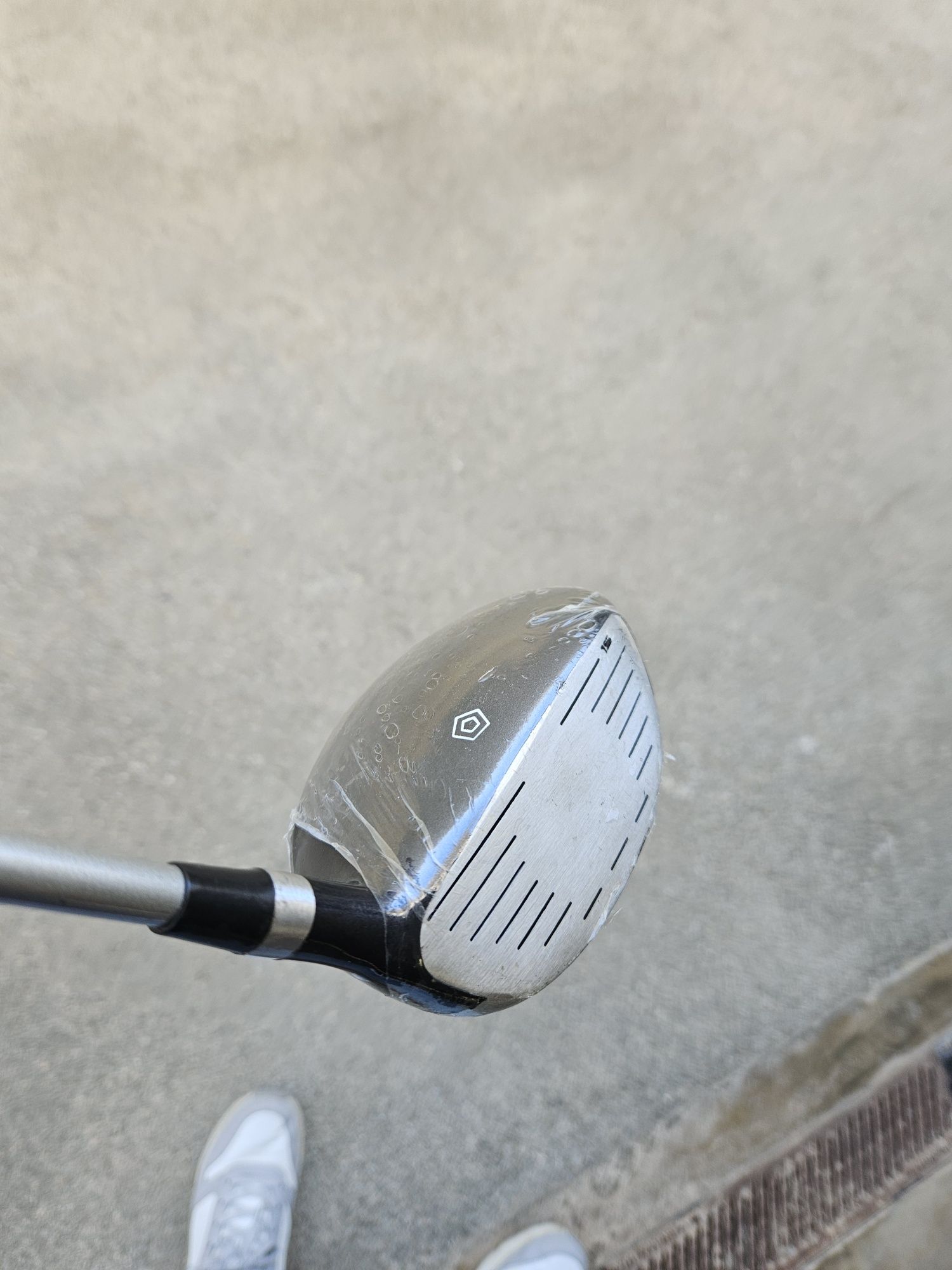 Taco de golfe novo