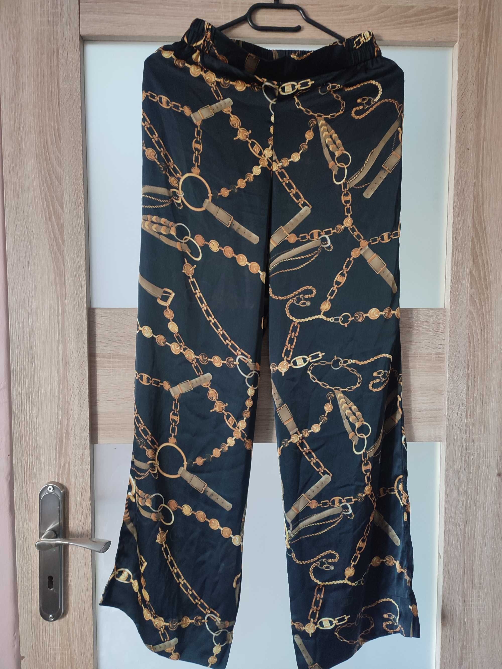Spodnie damskie modne eleganckie karmamia Black vintage rozmiar xs