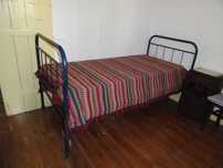 Cama individual em ferro