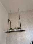 Prateleira/suporte decorativo em metal preta