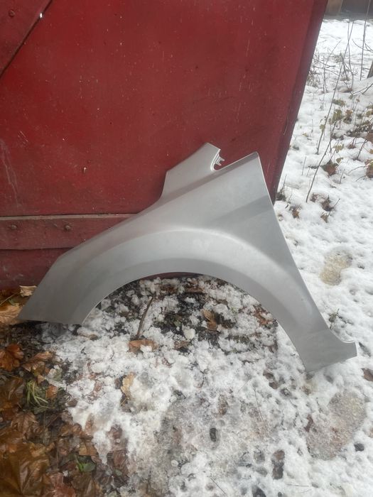 Blotnik lewy Ford focus mk2 Lift