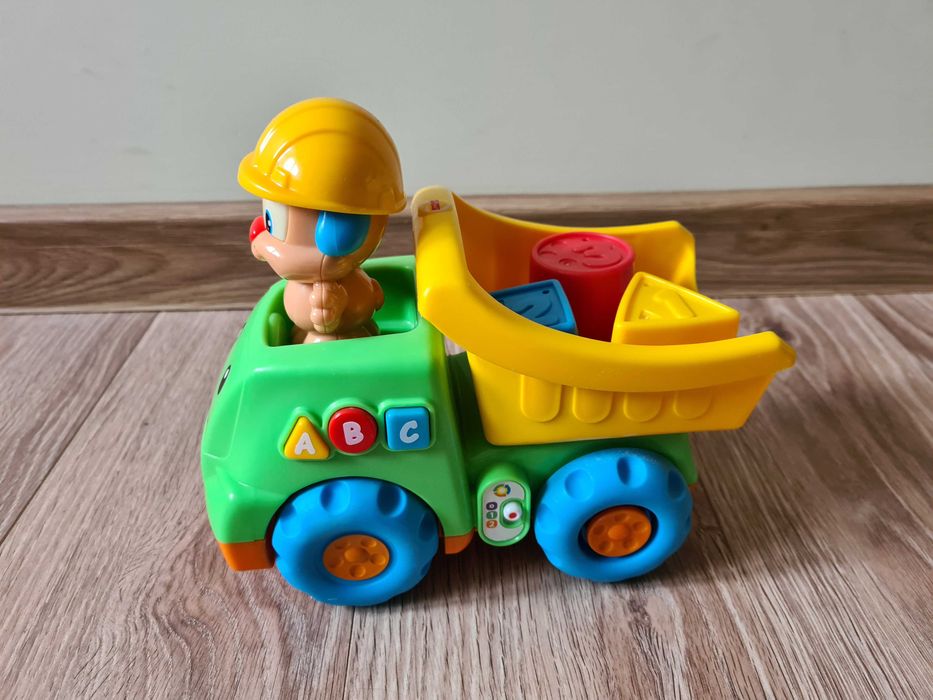 Wywrotka Szczeniaczka -uczniaczka Fisher Price samochodzik