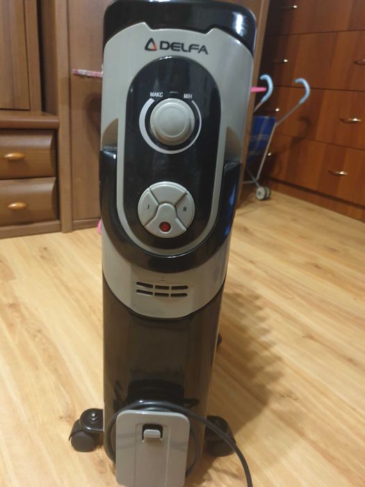 Продам масляний обігрівач DELFA