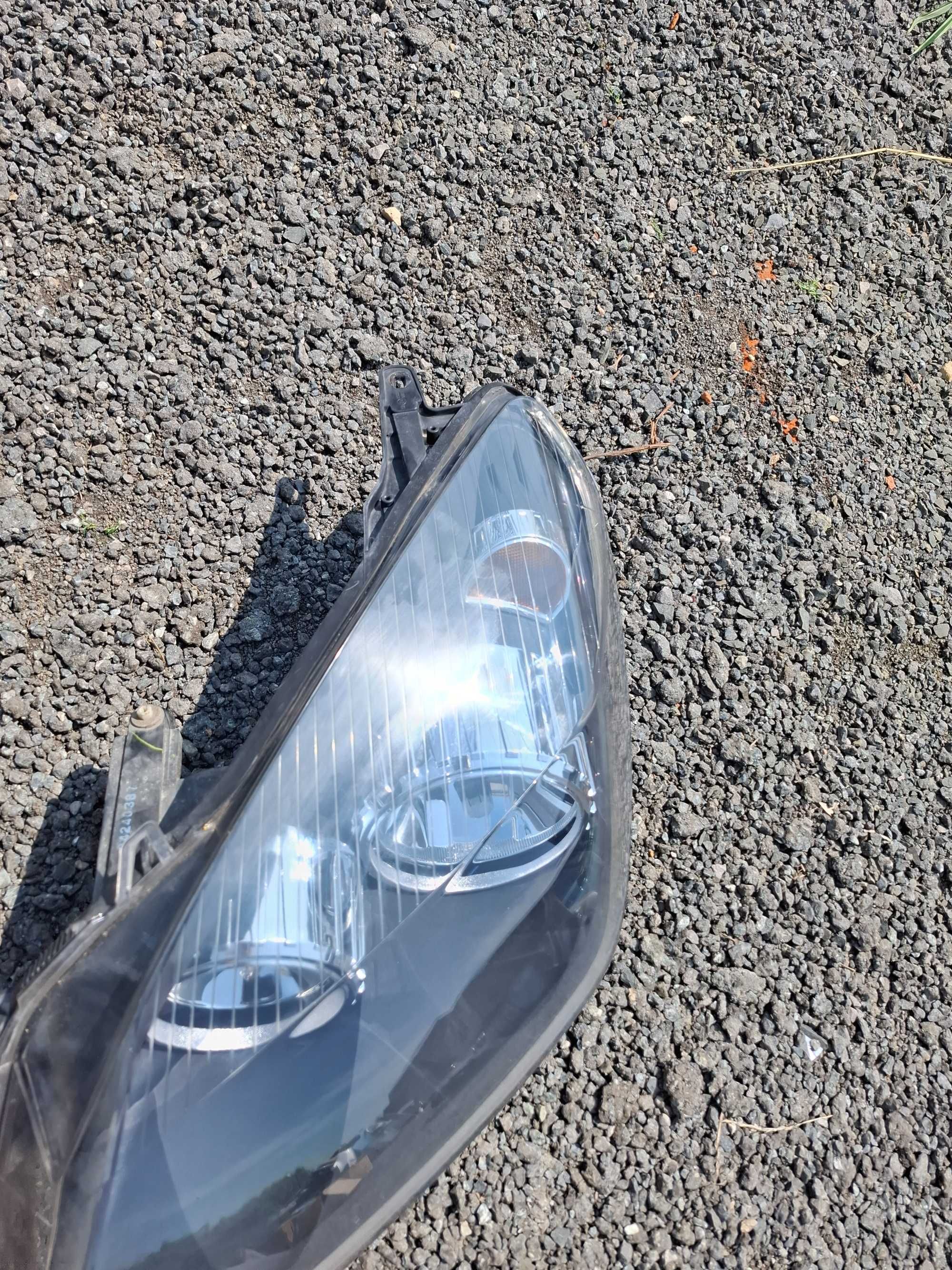 Reflektor lewy przód Opel Astra H