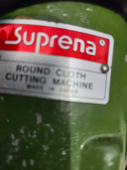 Máquina de cortar tecidos Suprema.