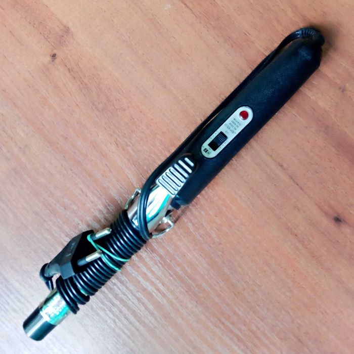 Електричні щипці-плойка для завивки волосся