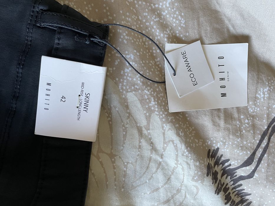 Nowe woskowane spodnie mohito skinny 42