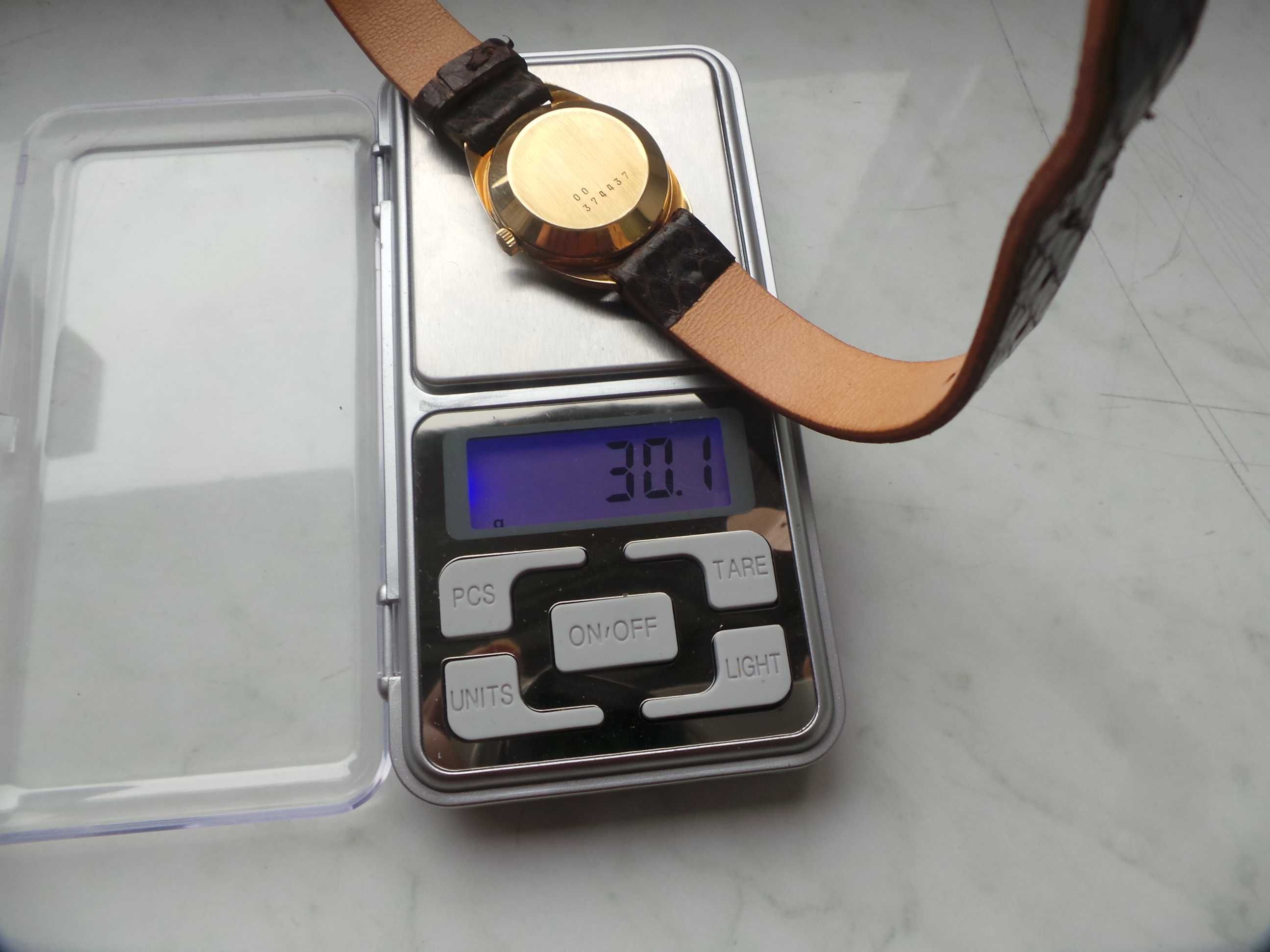 złoty zegarek damski Longines automat 18k
