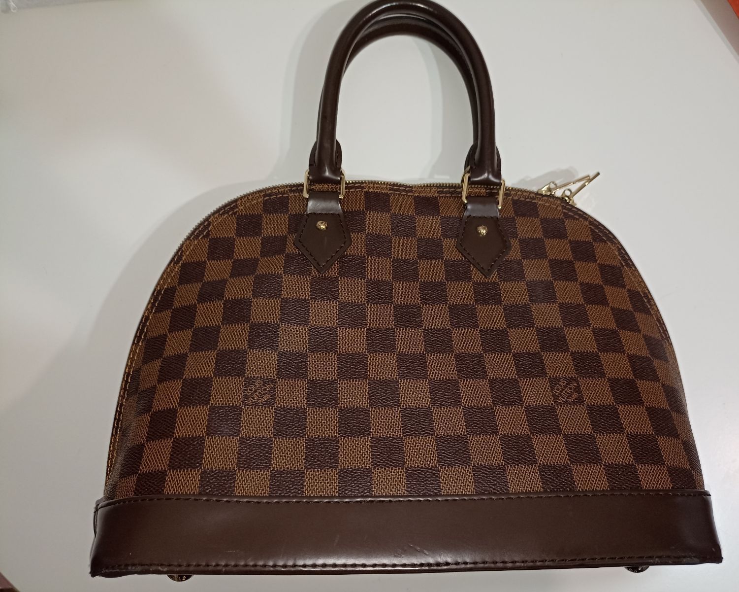 Стильна сумочка Louis Vuitton. 
з кодом