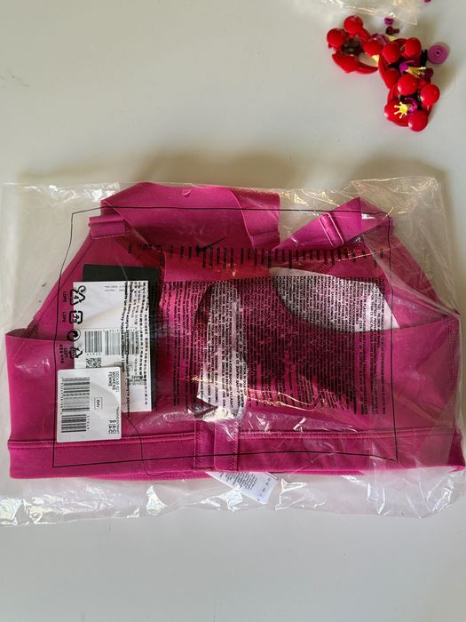 biustonosz Nike Dri Fit Alpha w kolorze różowym