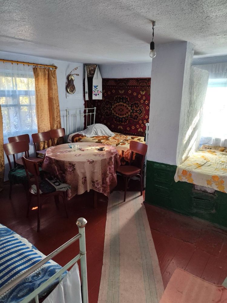 Продається ділянка з будинком