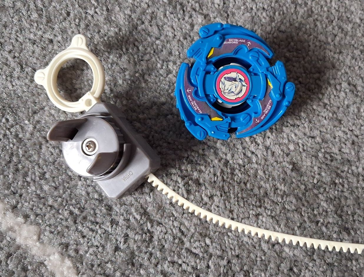 Dysk Beyblade Seaborg + Wyrzutnia
