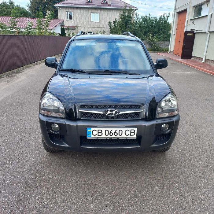 Hyundai Tucson, I покоління  2.0 DOHC МТ (142 к.с.) 4WD  Base