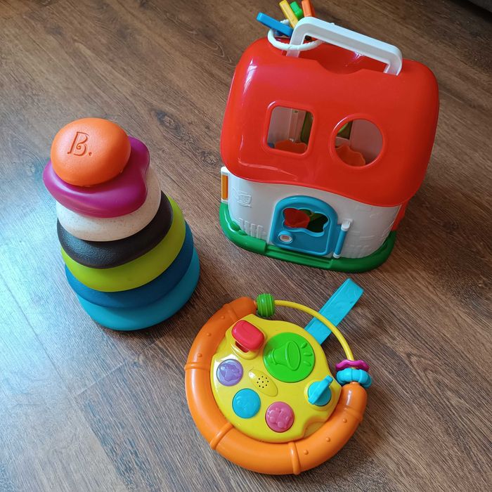 Набір іграшок: музичне кермо, сортер, піраміда