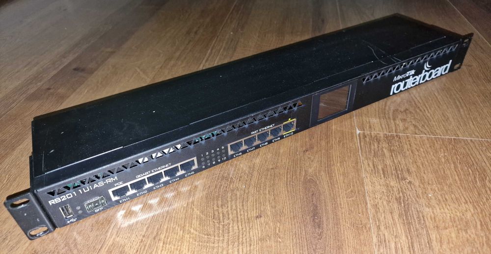 Маршрутизатор MikroTik RB2011UiAS-RM (5x1G, 5x100M, 1xSFP)