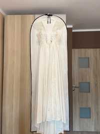 Sprzedam nową dizajnerską sukienkę ślubną, roz. 36-38.