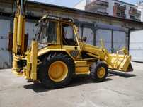 Koparko-ładowarka Caterpillar 428, 1990r