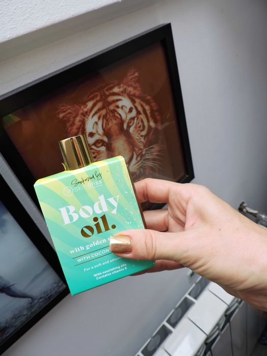 Skin Bliss Nowy olejek do ciała złoty połysk