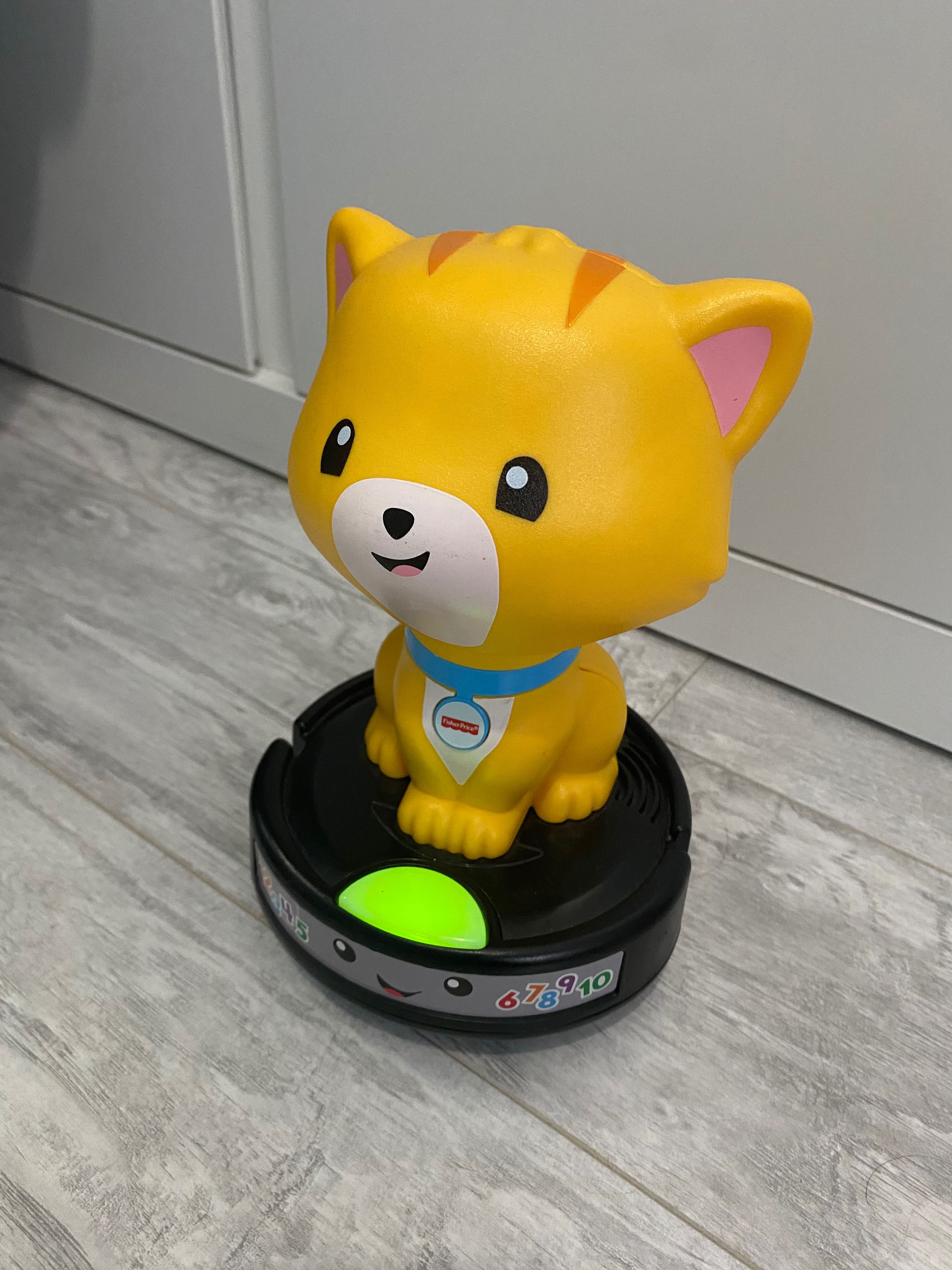 Kot na odkurzaczu Fisher Price zabawka
