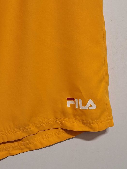 Нові жовті шорти Fila