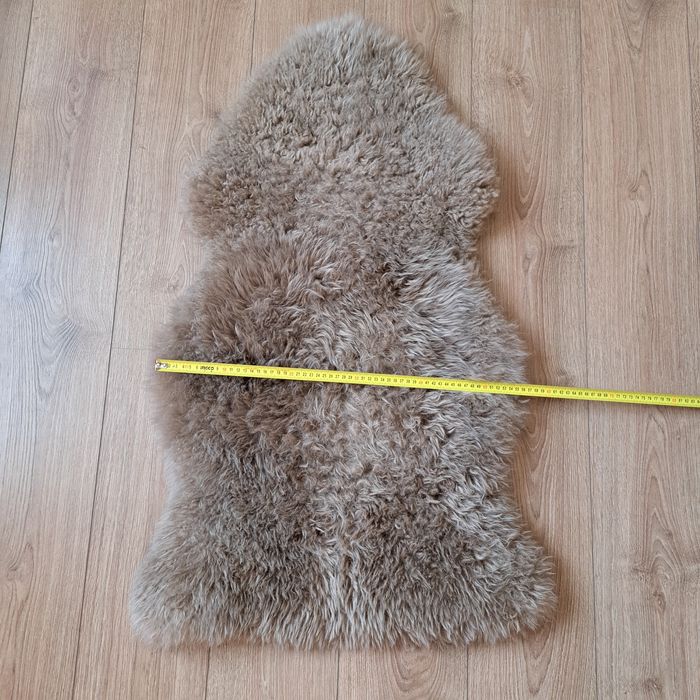 Коврик Ikea,  овечья шкура, овчина 1метр× 55 см  практически новый.