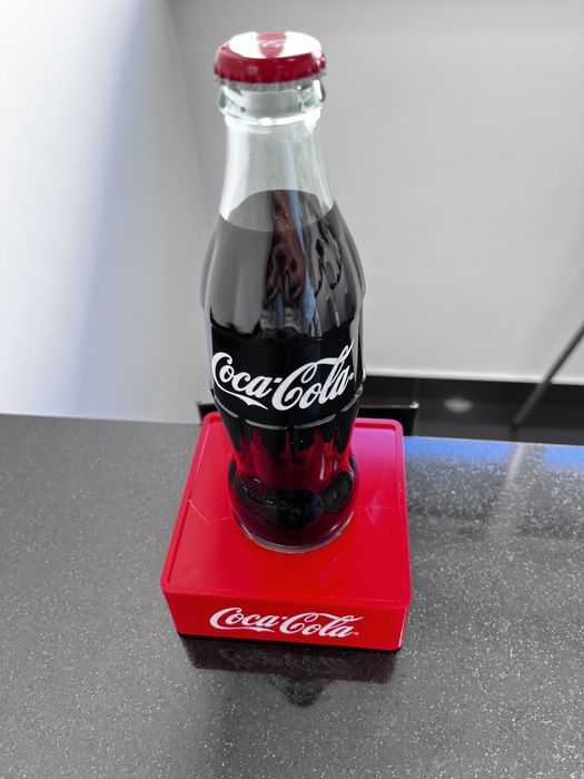 Coca Cola descapsulador saca caricas