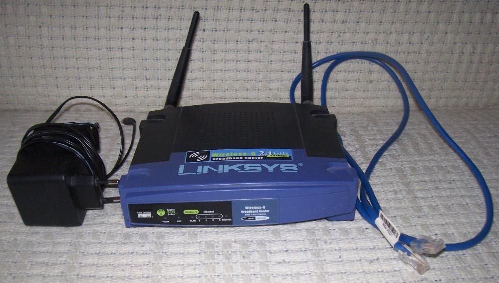 Router Linksys z zasilaczem