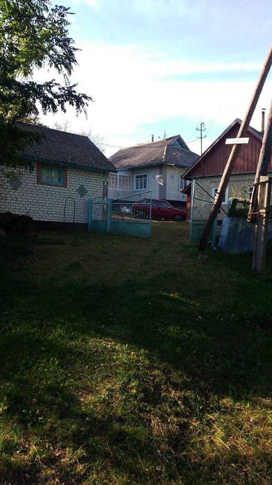Продам будинок, с. Куча. ділянка 50 ст.
