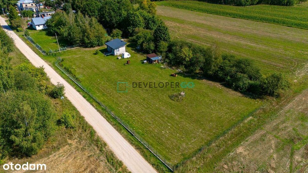 Działka w malowniczej okolicy z domem letniskowym