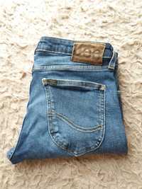 Granatowe spodnie jeansy Lee